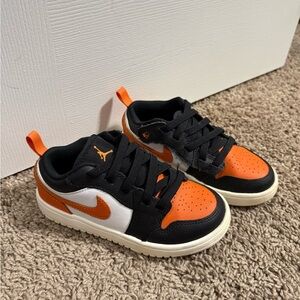 Kids' Nike Jordan Black and Orange Sneakers